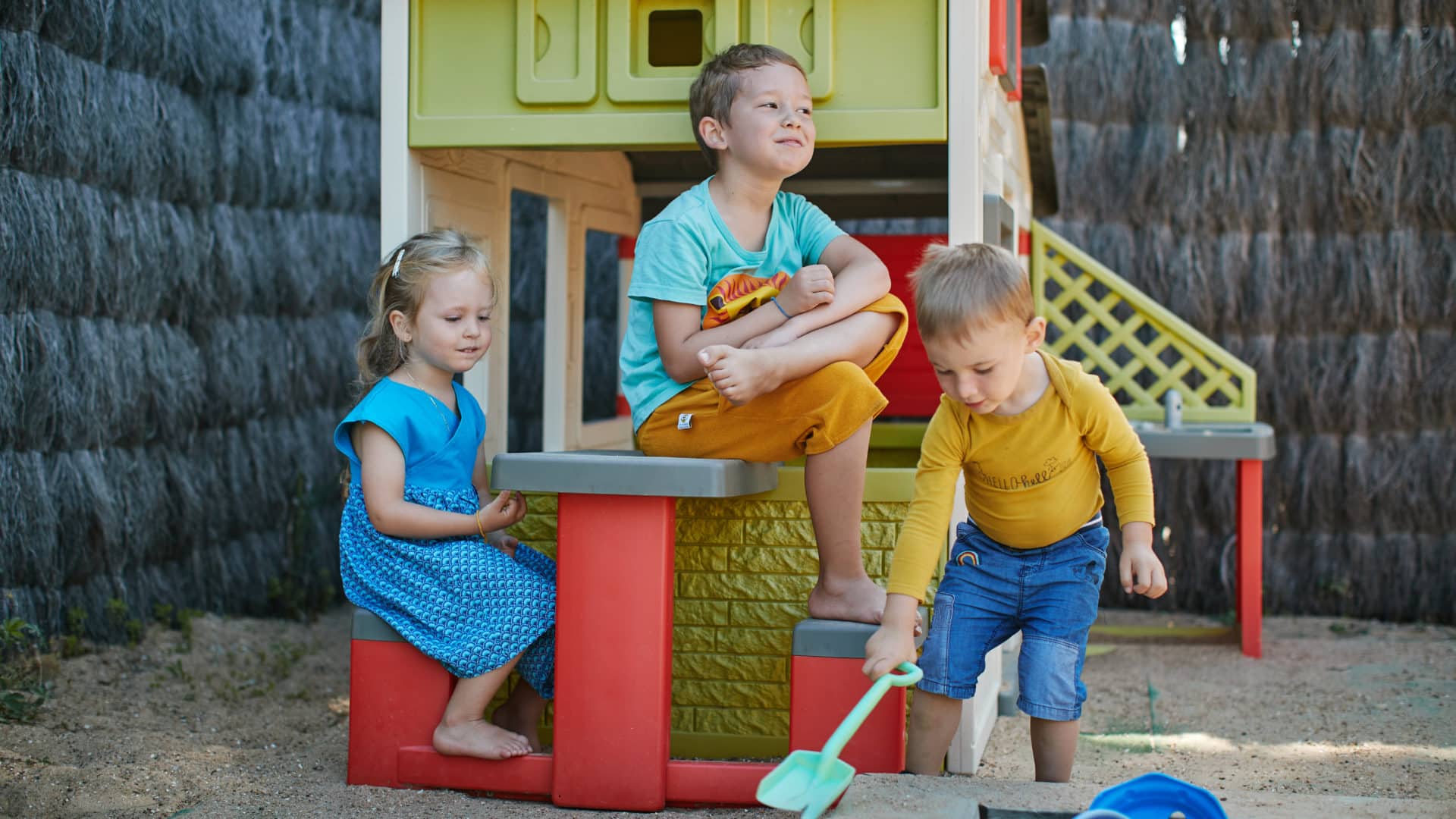 Children playing in the sandpit at the Au Soir d'Été campsite in Mesquer, Loire-Atlantique, France.